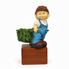 Boy Pushing Trolley Planter Pot