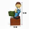 Boy Pushing Trolley Planter Pot