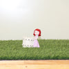 Little Girl with Picket Fence Planter